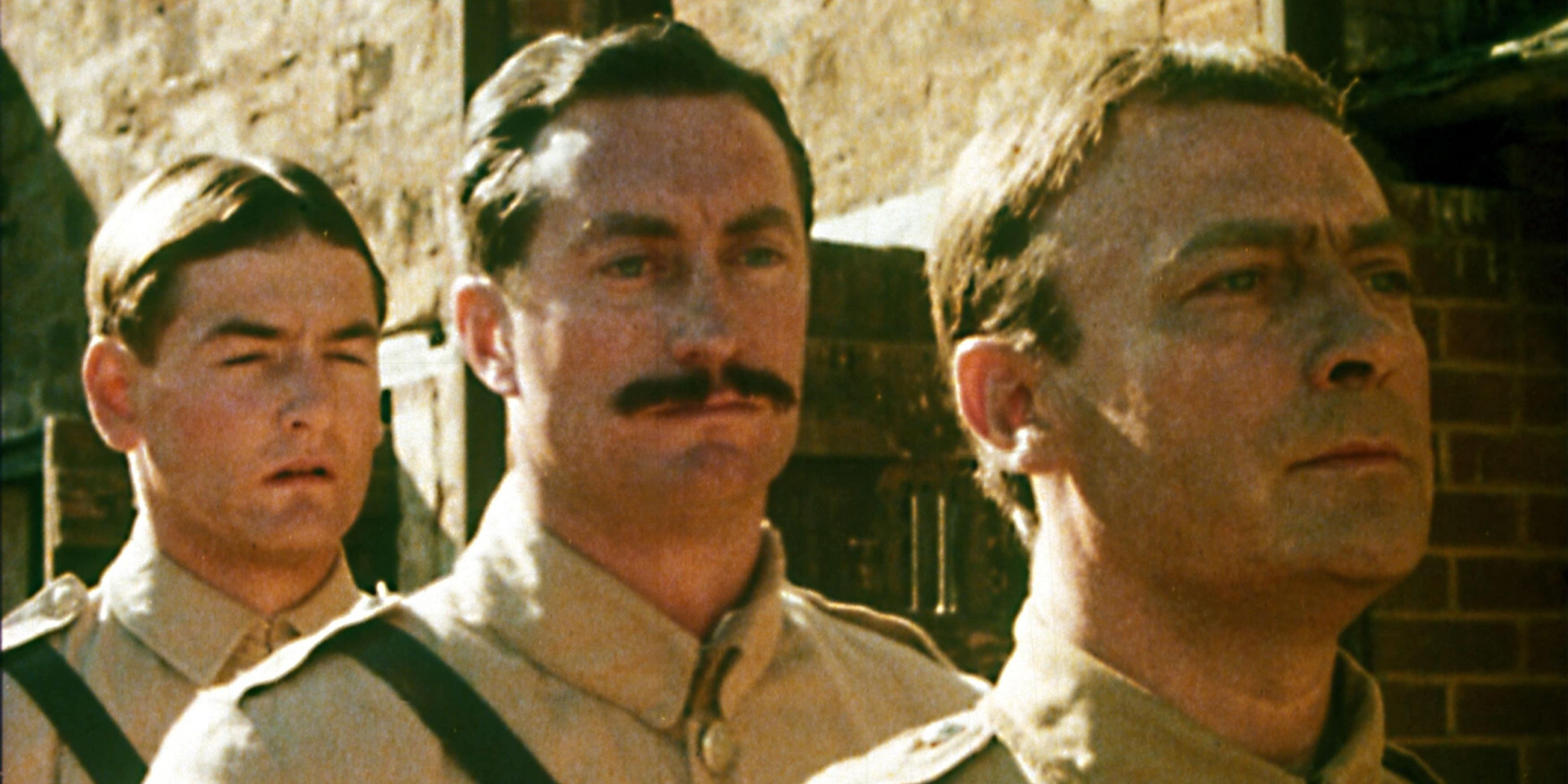 Three soldiers standing by in 'Breaker Morant'