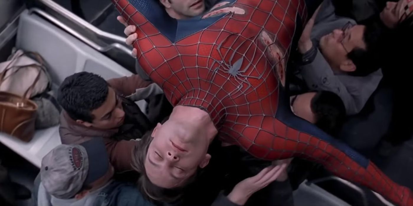 Train passengers carrying Spider-Man in Spider-Man 2