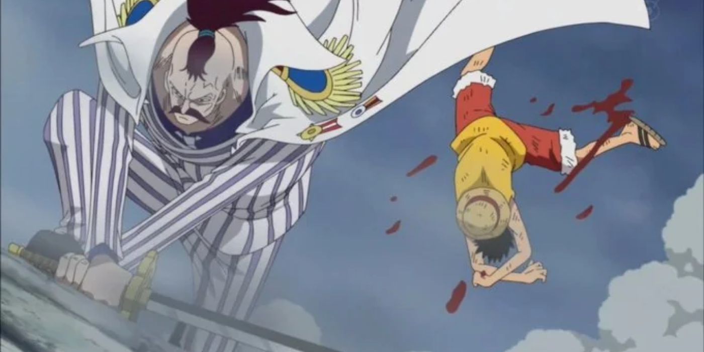 Vice Admiral Momonga crouching down as he just slashed Luffy in One Piece