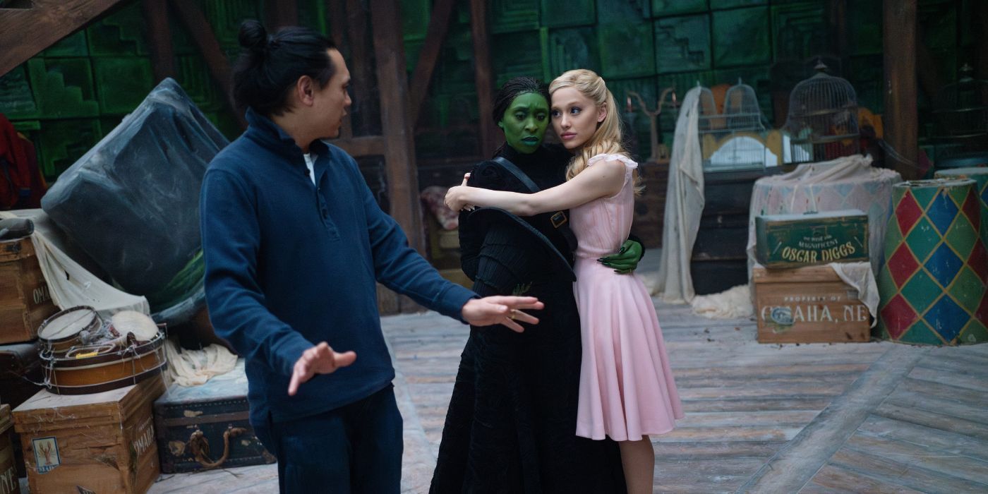 Jon M. Chu directing Cynthia Erivo and Ariana Grande on the set of Wicked.