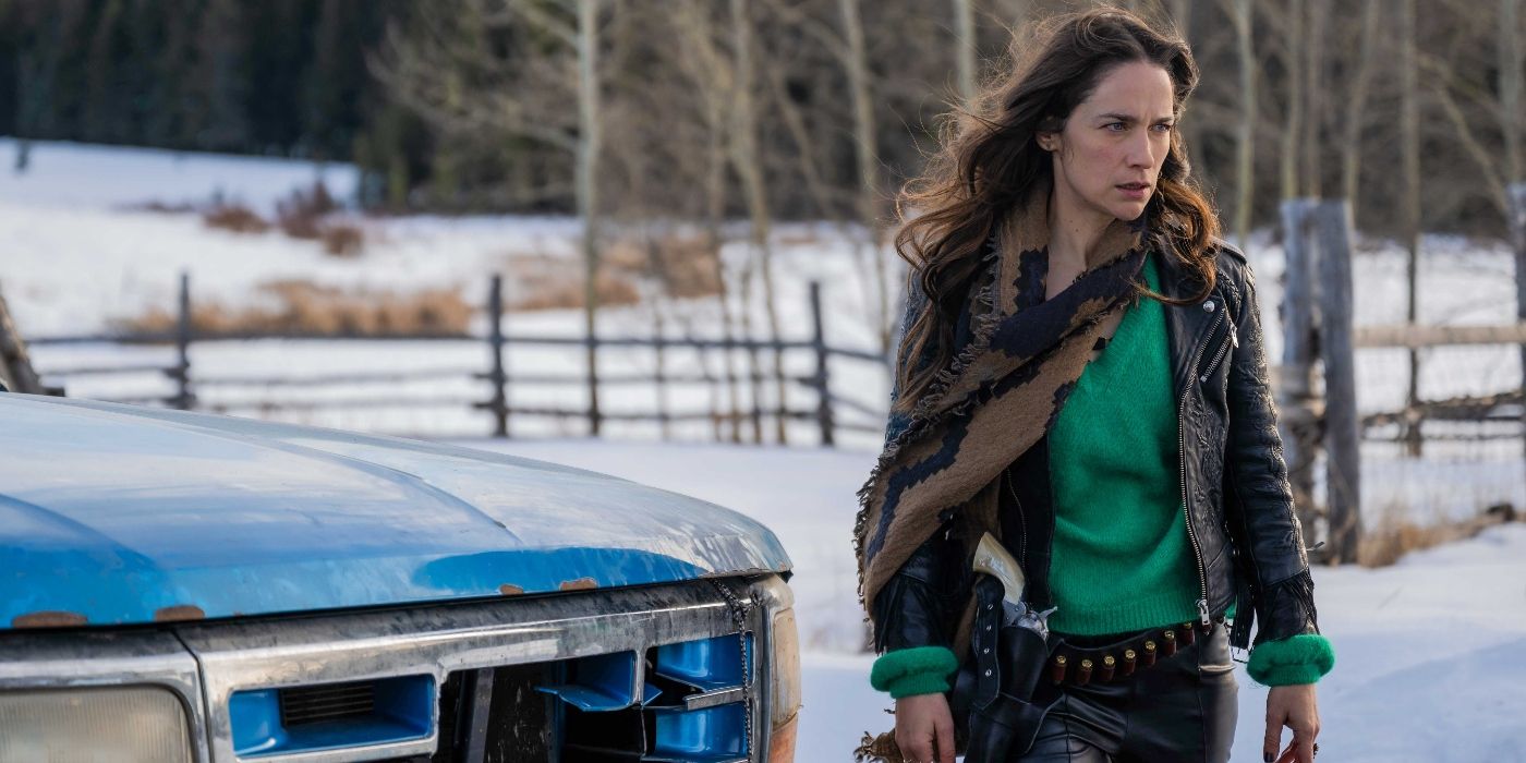 Melanie Scrofano by Wynonna's truck in the snow in Wynonna Earp: Vengeance