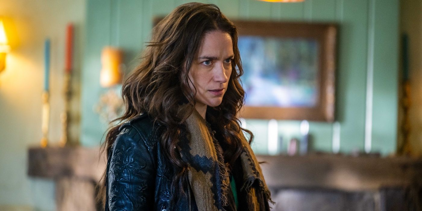 Melanie Scrofano as Wynonna Earp scowling in a living room in Wynonna Earp: Vengeance