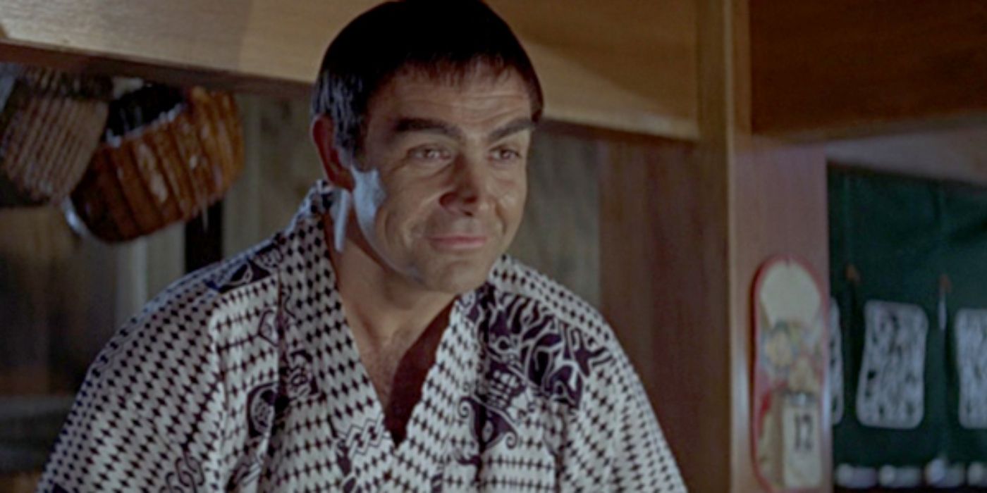 James Bond (Sean Connery) smiles while disguised as a Japanese man in You Only Live Twice (1967).