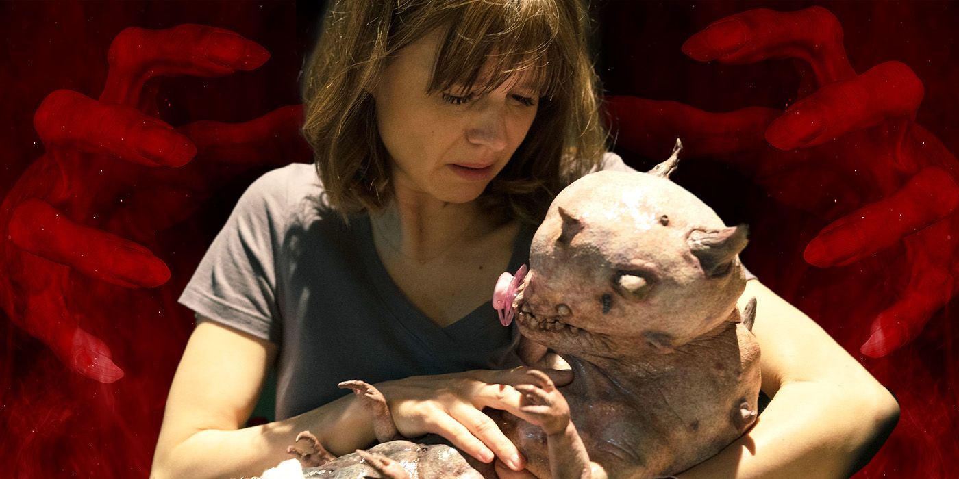 Katja Herbers as Dr. Kristen Bouchard on Evil, holding the Demon Baby and looking sad, with large red hands reaching out behind her