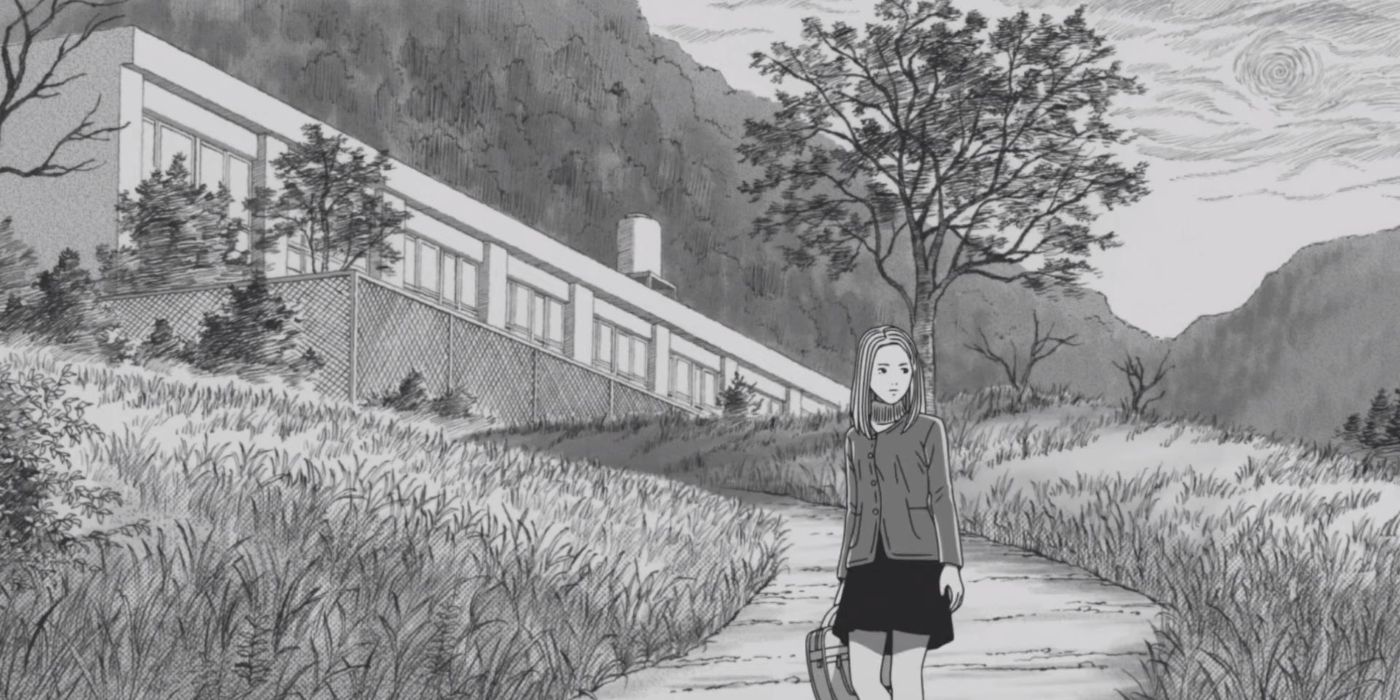 a character in Uzumaki walking down a path from a building