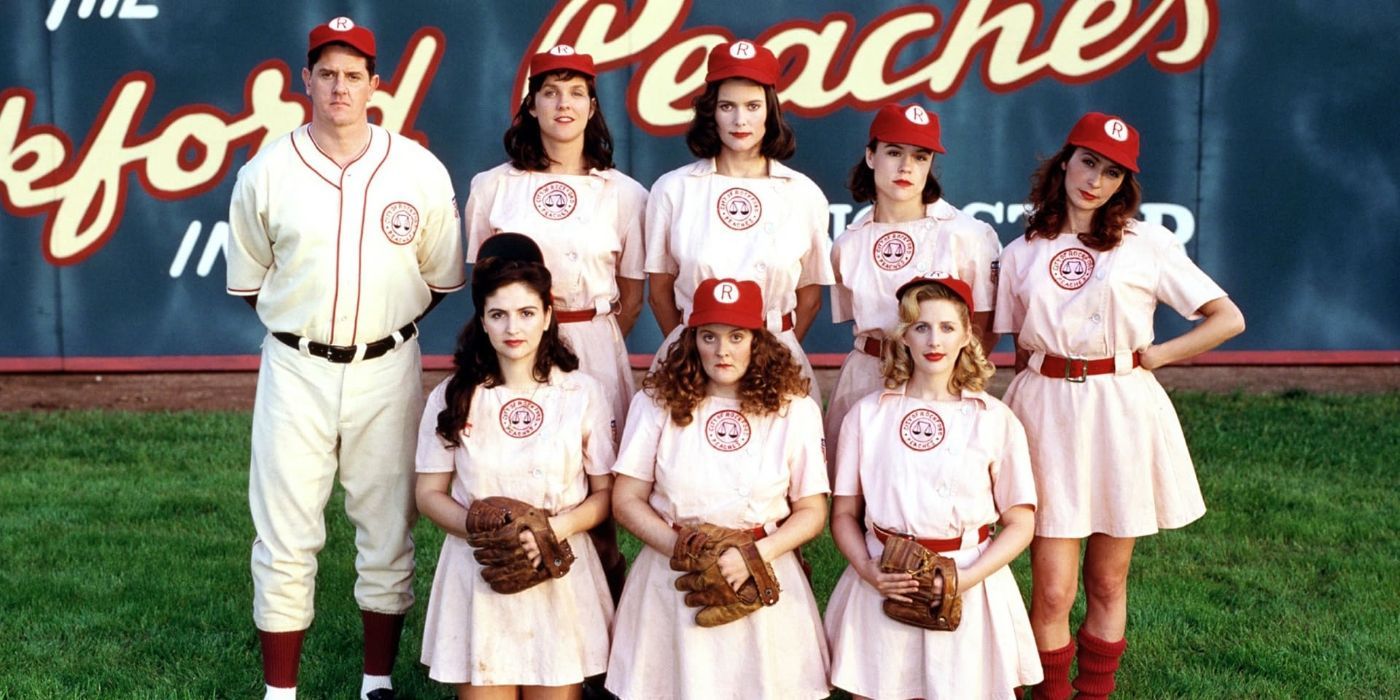 The Rockford Peaches pose for a photo next to coach Jimmy Dugan in the television series A League of Their Own