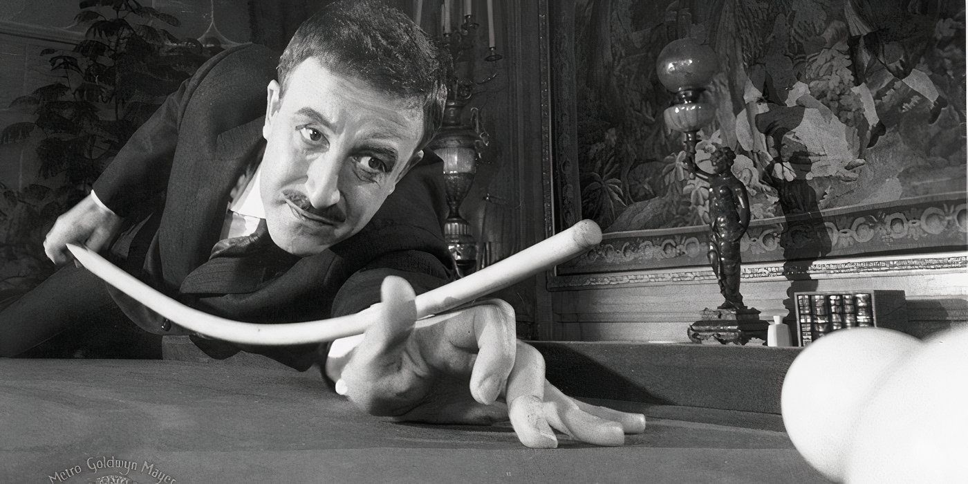 Inspector Cluseau leaning over a pool table to make a shot in A Shot in the Dark