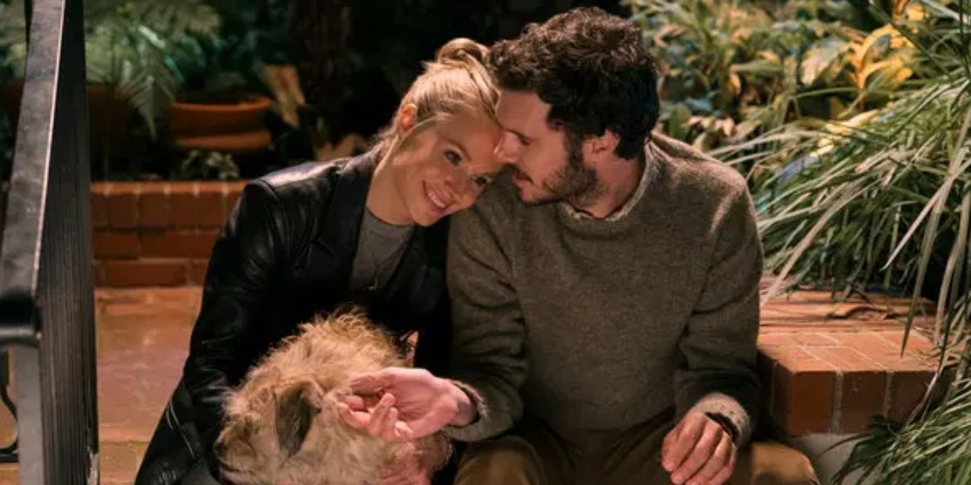 Kristen Bell with her head resting on Adam Brody's shoulder sitting on the front stoop in 'Nobody Wants This'.