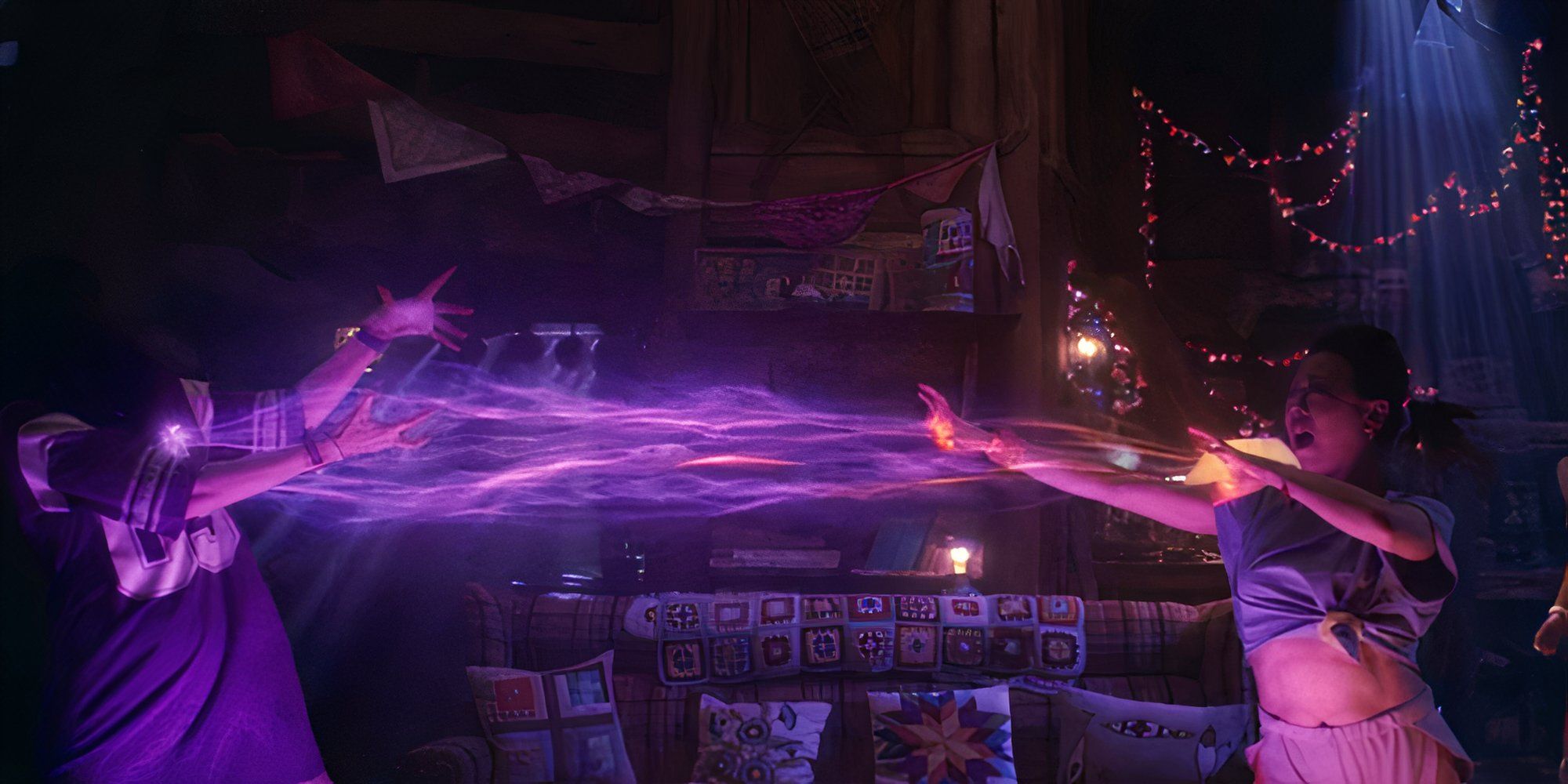 Alice (Ali Ahn) blasts Agatha (Kathryn Hahn) with orange magic, while Agatha&rsquo;s purple magic drains Alice.