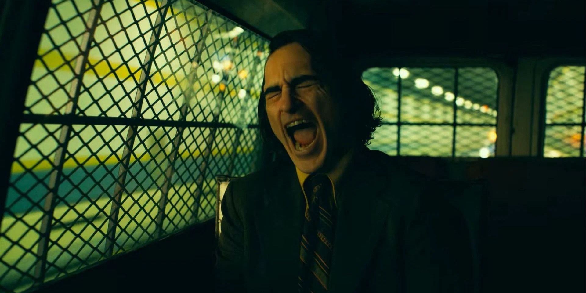 Arthur laughing in a cop car in 'Joker Folie a? Deux'