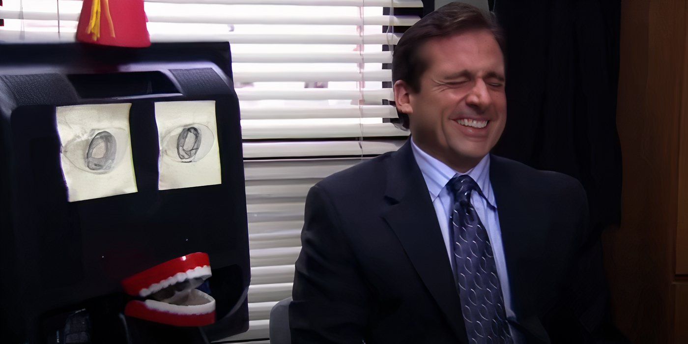 Michael (Steve Carell) laughs as he pranks his coworkers with Harvey the Computer in 'The Office'.