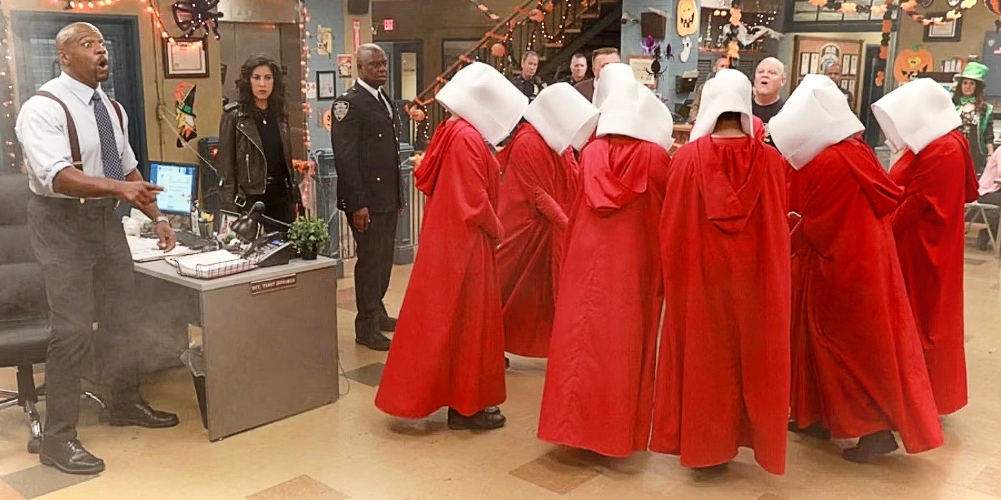 Terry, Rosa, Holt, Hitchcock, and a bunch of handmaids in Brooklyn 99 B99 Season 5 Halloween heist