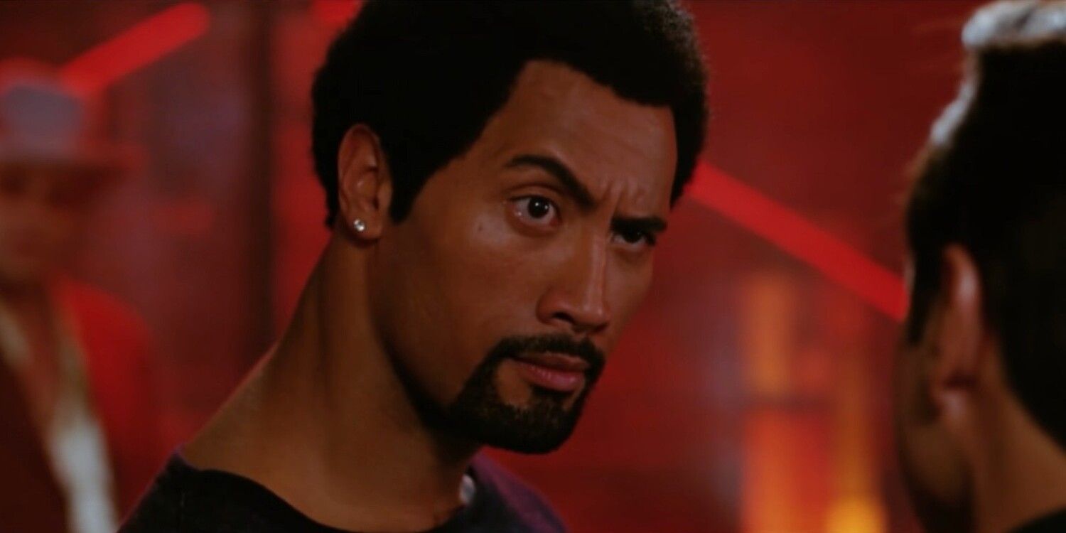 Dwayne Johnson as Elliot Wilhelm raising his eyebrow in 'Be Cool' (2005)