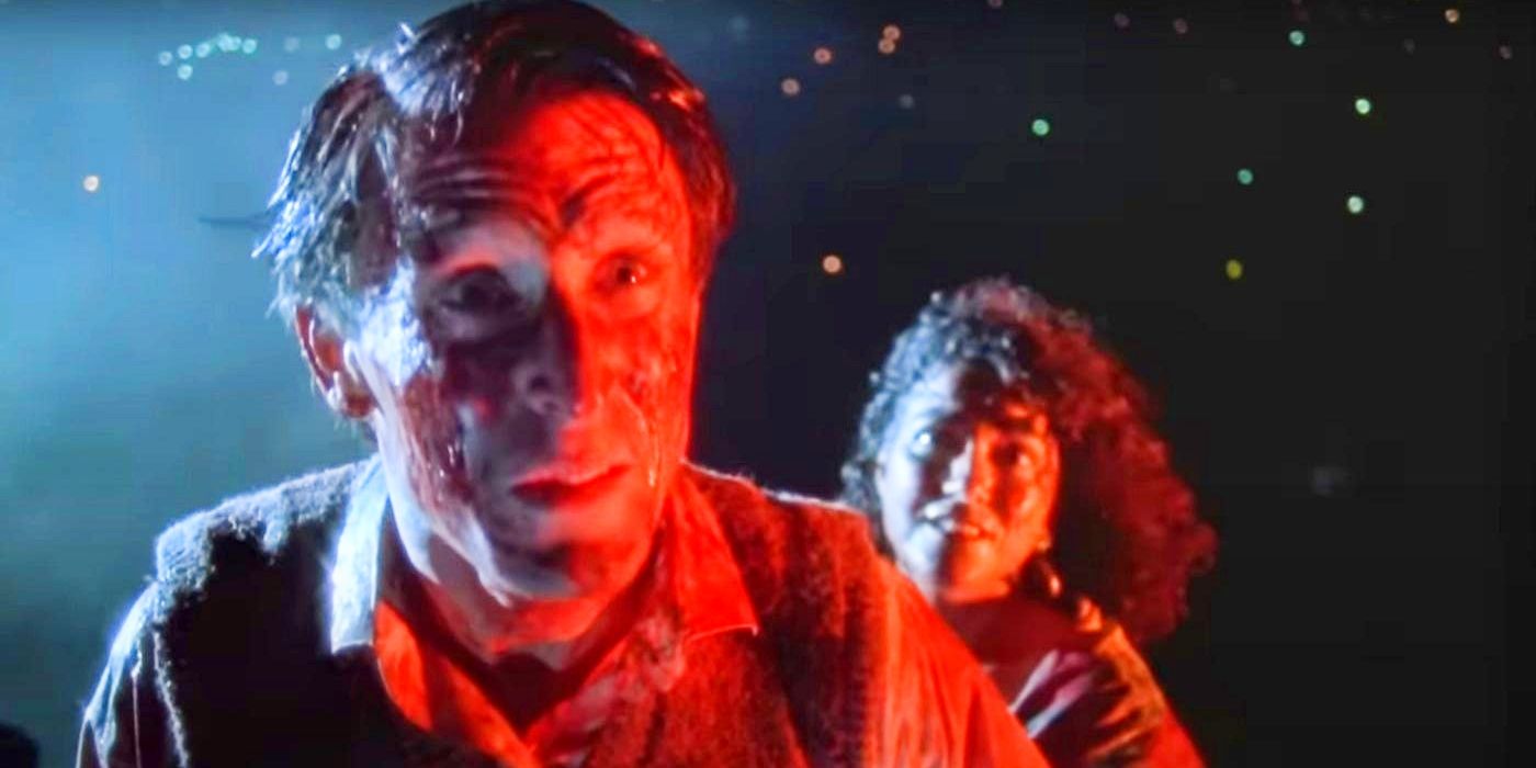 Lionel, played by actor Timothy Balme, and Paquita, played by actor Diana Peñalver, covered in blood in Braindead.