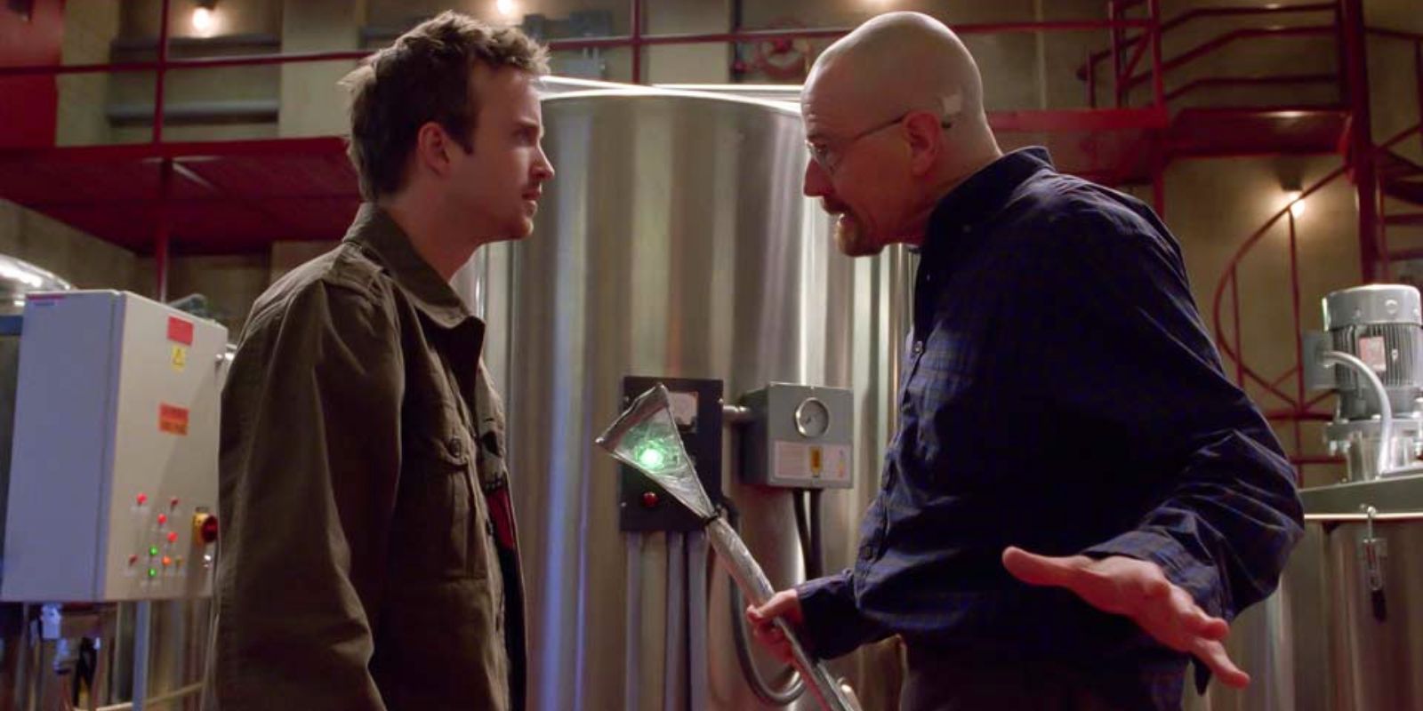 Jesse and Walter arguing, face to face in Breaking Bad.