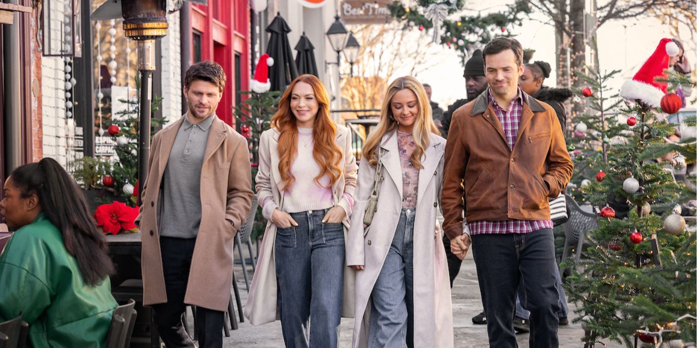 Lindsay Lohan standing next to Jon Rudnitsky, Katie Baker, and Ian Hardin in 'Our Little Secret'.