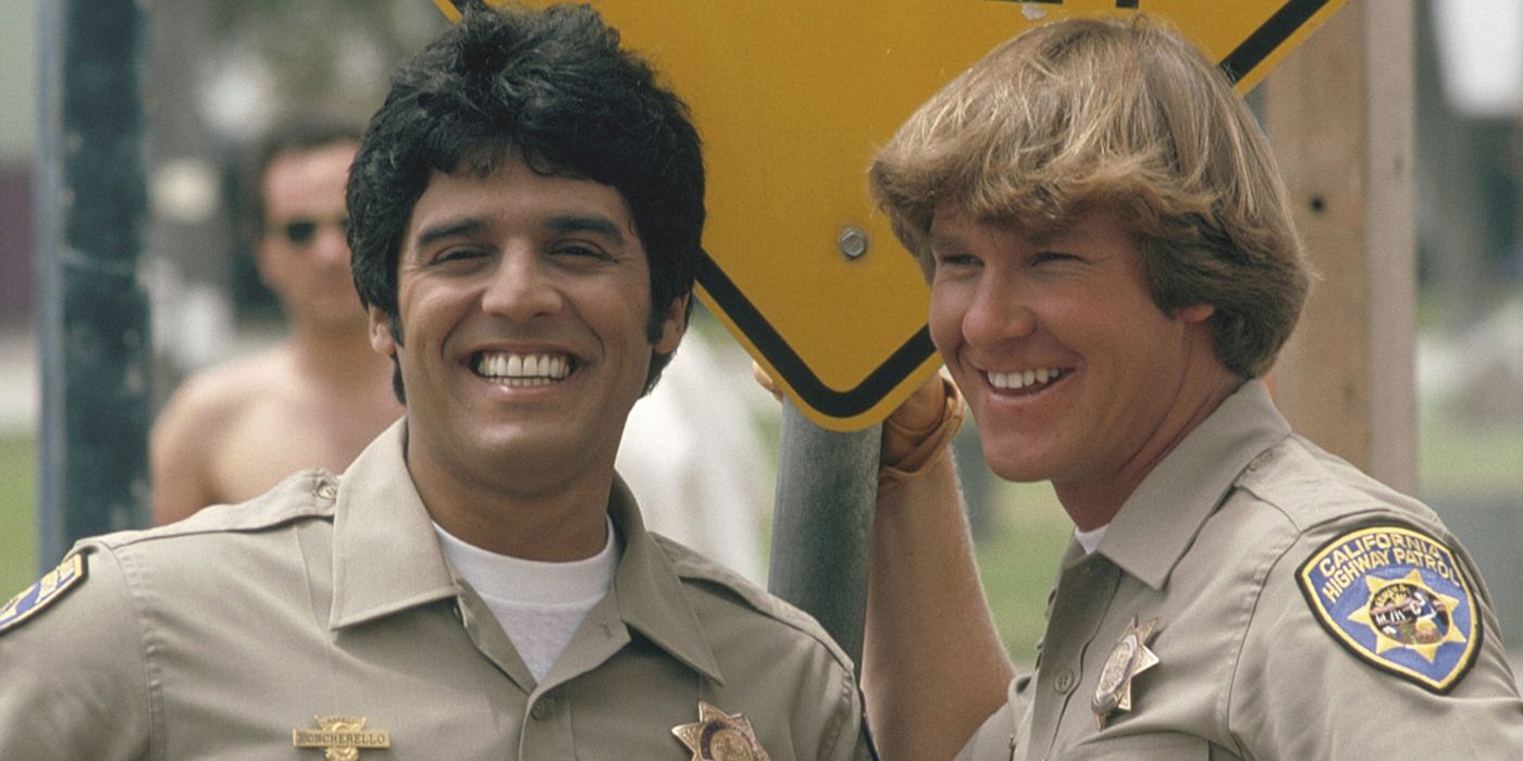 Ponch and Jon smiling in their uniforms in CHiPs