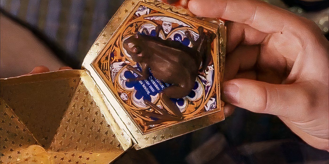 Harry holds a chocolate frog in &lsquo;harry potter and the philosopher&rsquo;s stone&rsquo;
