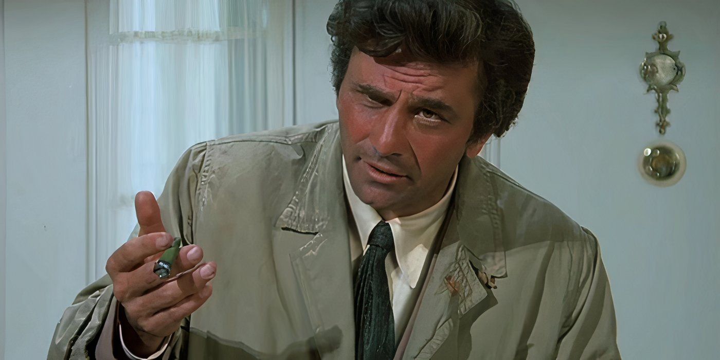 Peter Falk as Frank Columbo in Columbo holding something in his hand and looking inquisitively.