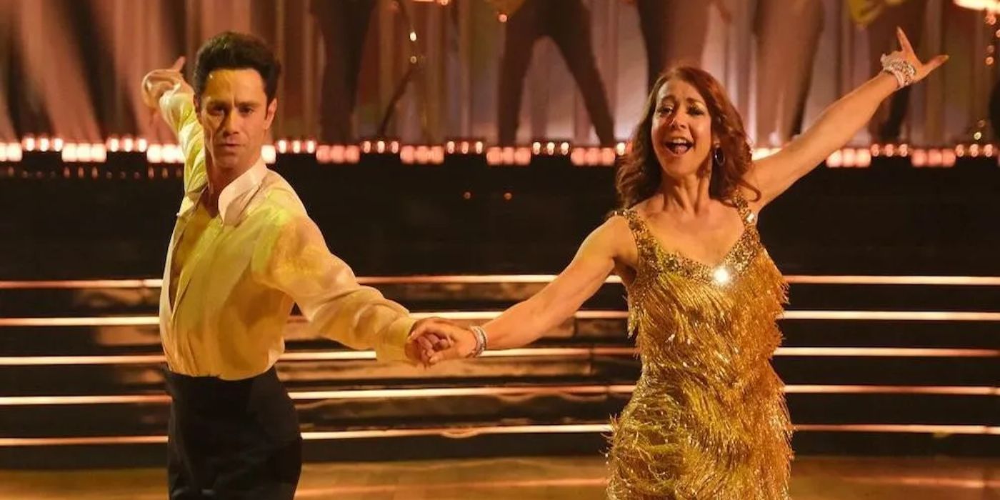 A couple dance together on Dancing with the Stars Taylor Swift night.