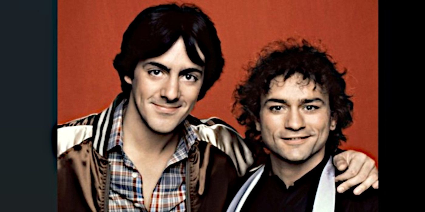 Billy Manucci poses next to his brother Tony with an arm around Tony&rsquo;s shoulder