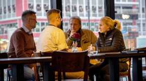 Captain Sig Hansen and Mandy Hansen sit at a restaurant in Norway on 'Deadliest Catch: The Viking Returns.'