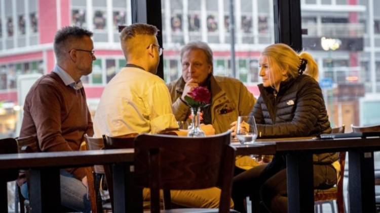 Captain Sig Hansen and Mandy Hansen sit at a restaurant in Norway on 'Deadliest Catch: The Viking Returns.'