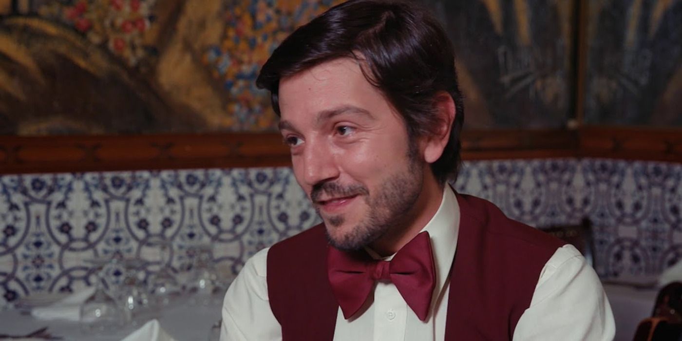 Diego Luna in a white shirt, red vest and red bowtie in 'If Beale Street Could Talk'