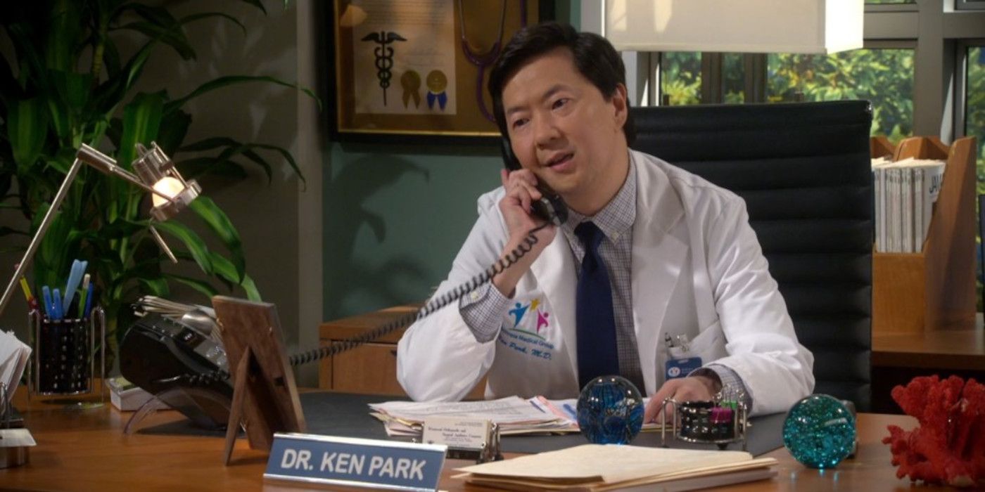 Dr. Ken takes a phone call in his office