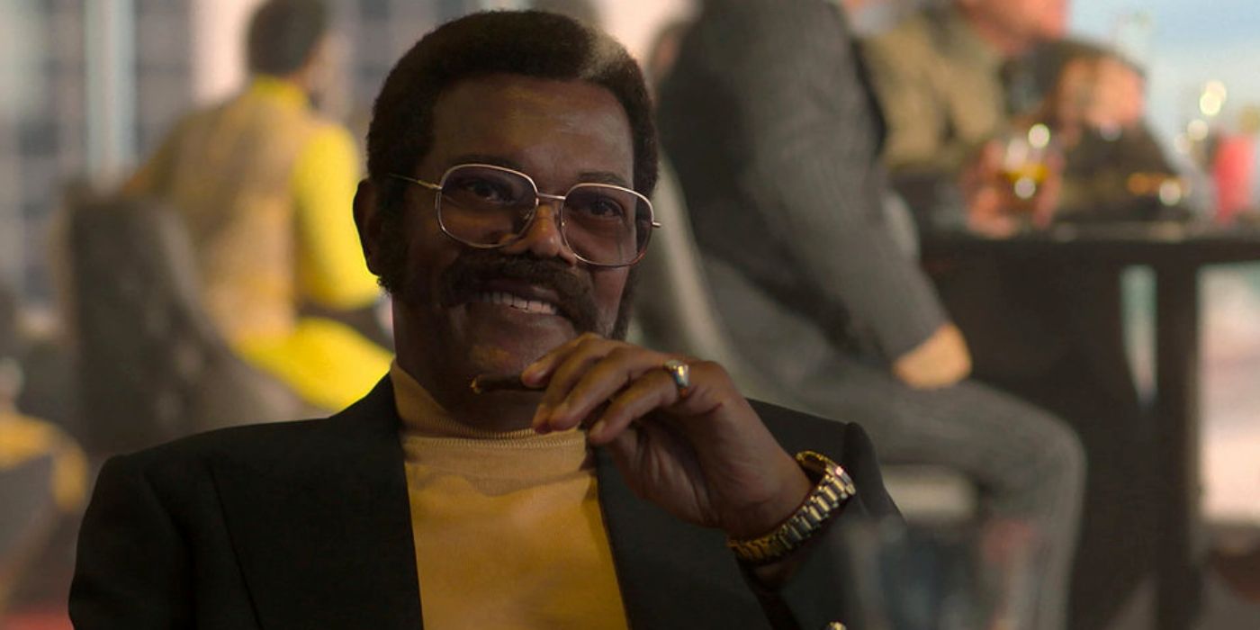Samuel L. Jackson as gangster Frank Moten smiling in a gold colored shirt in Fight Night