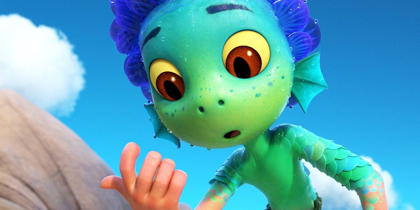 Sea monster Luca looks at his hand in awe as he transforms into a human in Pixar's Luca.