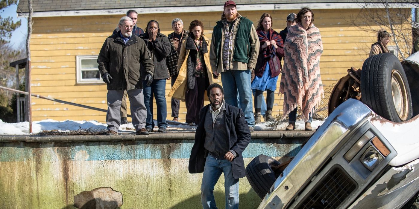 The cast of From, led by Harold Perrineau, looking at the empty swimming pool