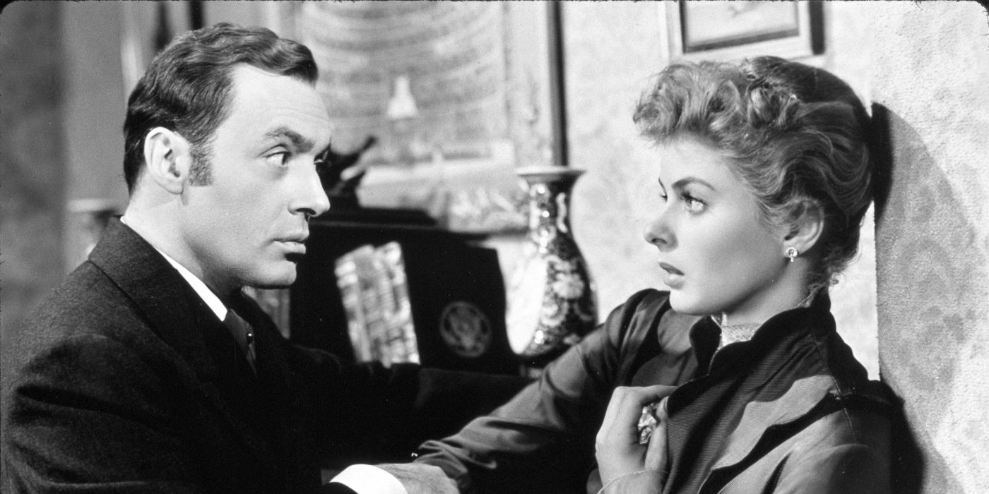 Gregory (Charles Boyer) pinning a frightened Paula (Ingrid Bergman) against the wall in Gaslight