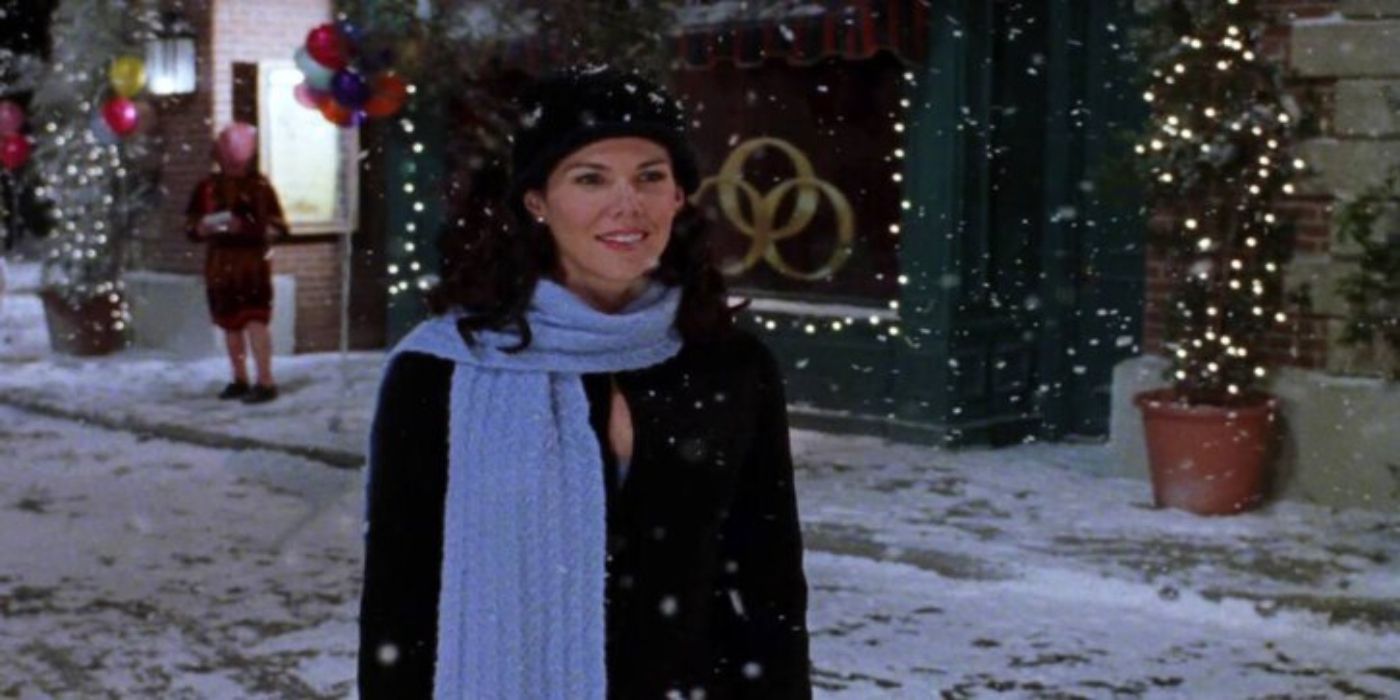 Lorelai Gilmore standing in the snow in Gilmore Girls. 