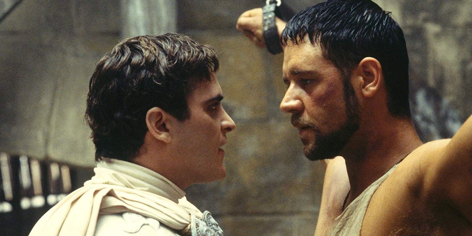 Maximus and Commodus stare at each other while Maximus is in chains in Gladiator.