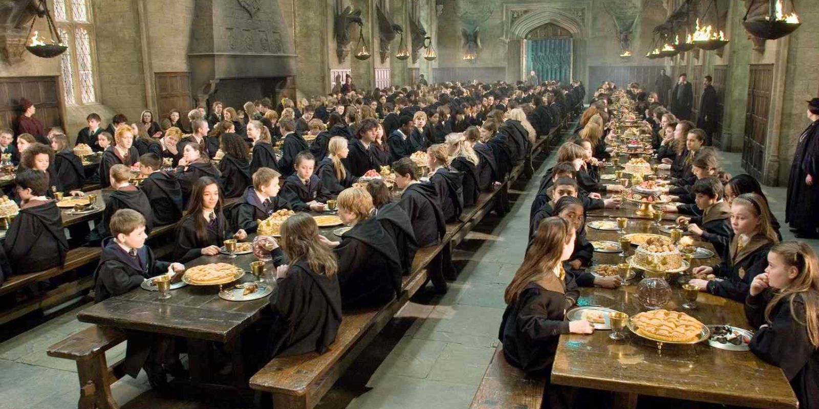 Students sitting at the Great Hall in Harry Potter