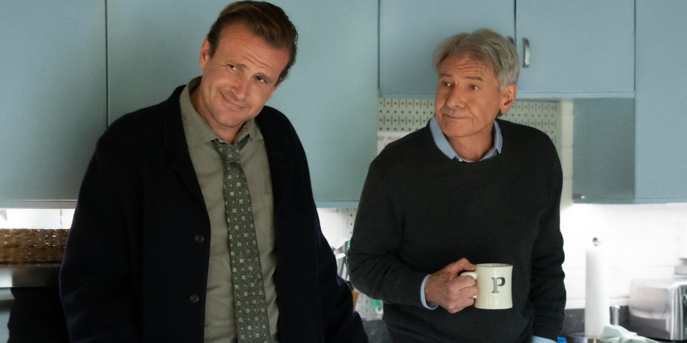 Harrison ford holding coffee and jason segel leaning his head and smiling in Shrinking Season 1