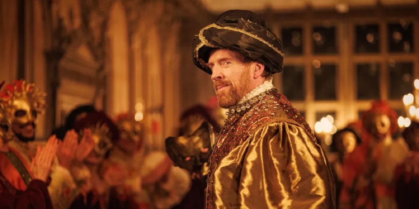 Damian Lewis as King Henry VIII in a lavish party in a ballroom in Wolf Hall: The Mirror And The Light.