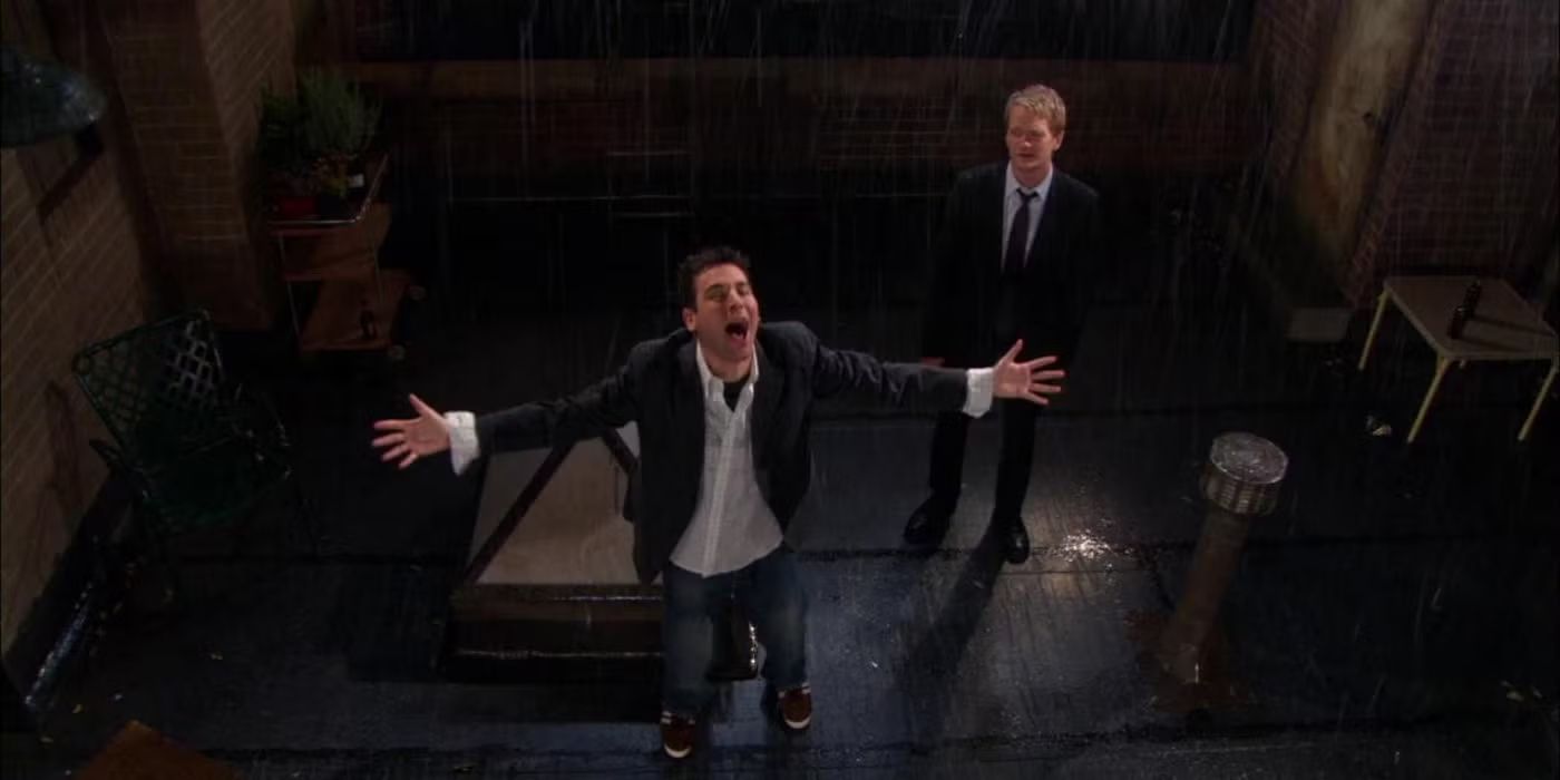 Ted Mosby stands in the rain on the roof of his apartment complex crying up at the sky while Barney Stinson stands judging him in the background in 'How I Met Your Mother' Season 1, Episode 22 "Come On".