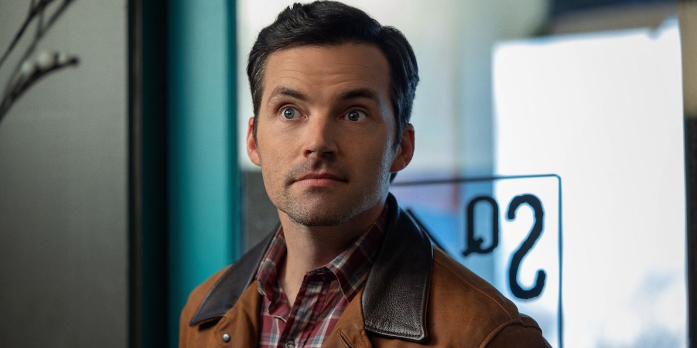 A close-up shot of Ian Harding with a straight face in Netflix's 'Our Little Secret'.