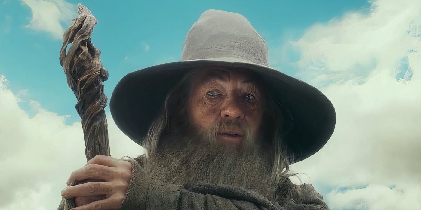Ian McKellen as Gandalf the Grey, holding his staff and looking down in The Hobbit