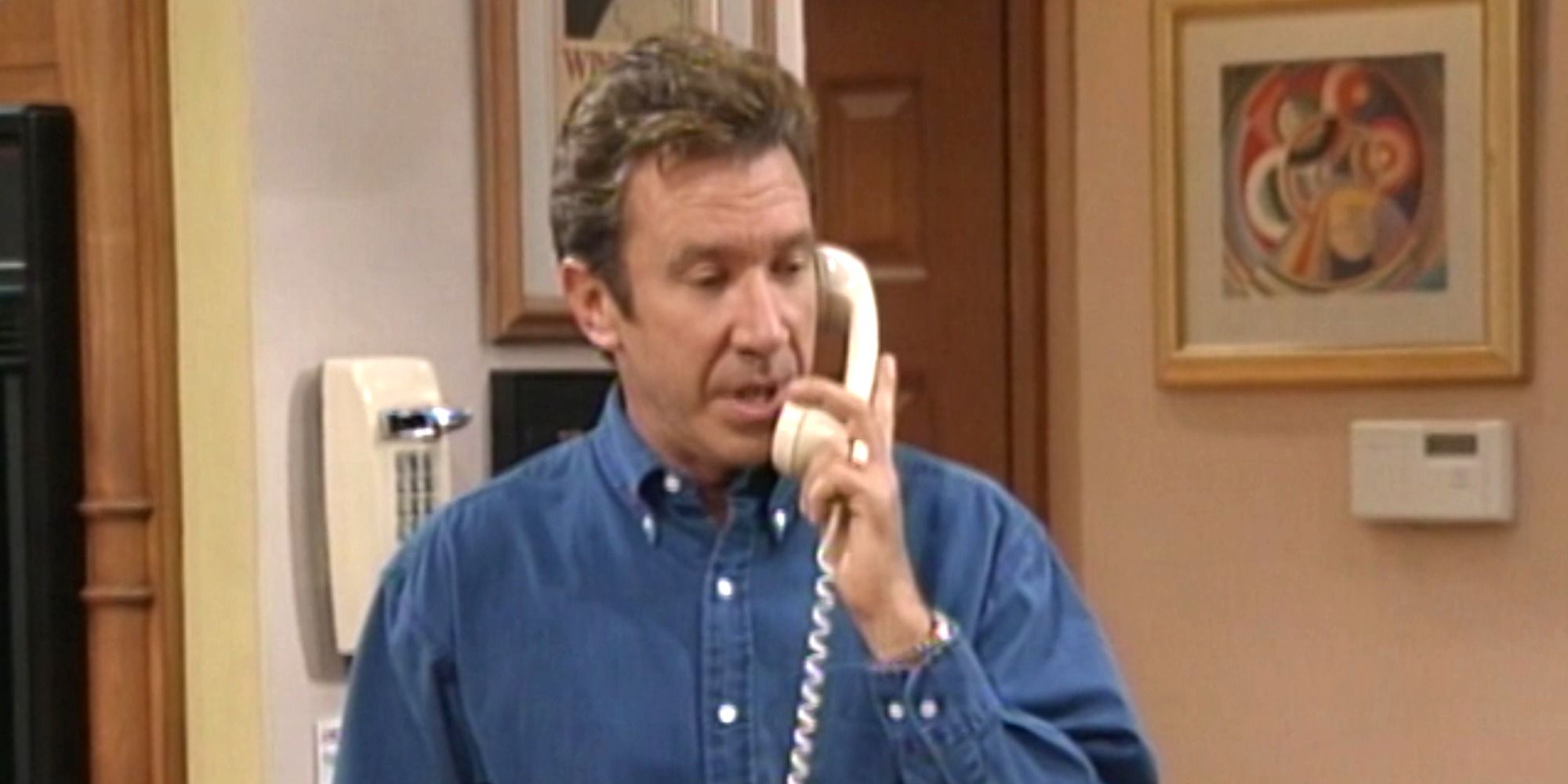 Tim Allen as Tim Taylor on the phone, reporting Wilson&rsquo;s (Earl Hindman) disappearance.
