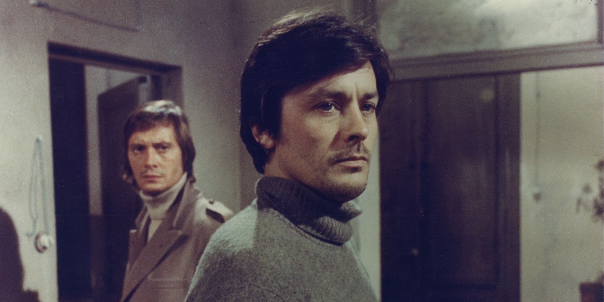 Alain Delon looks serious in Indian Summer (1972).