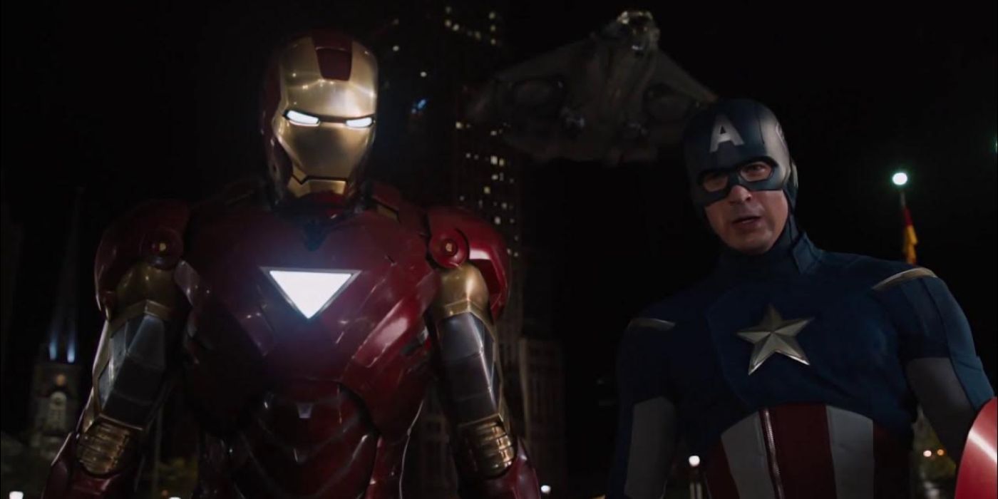 Iron Man standing next to Captain America in front of a quinjet in The Avengers