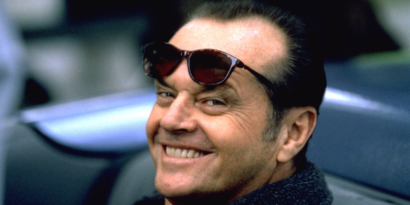 Melvin (Jack Nicholson) looking at the camera and smiling in As Good As It Gets