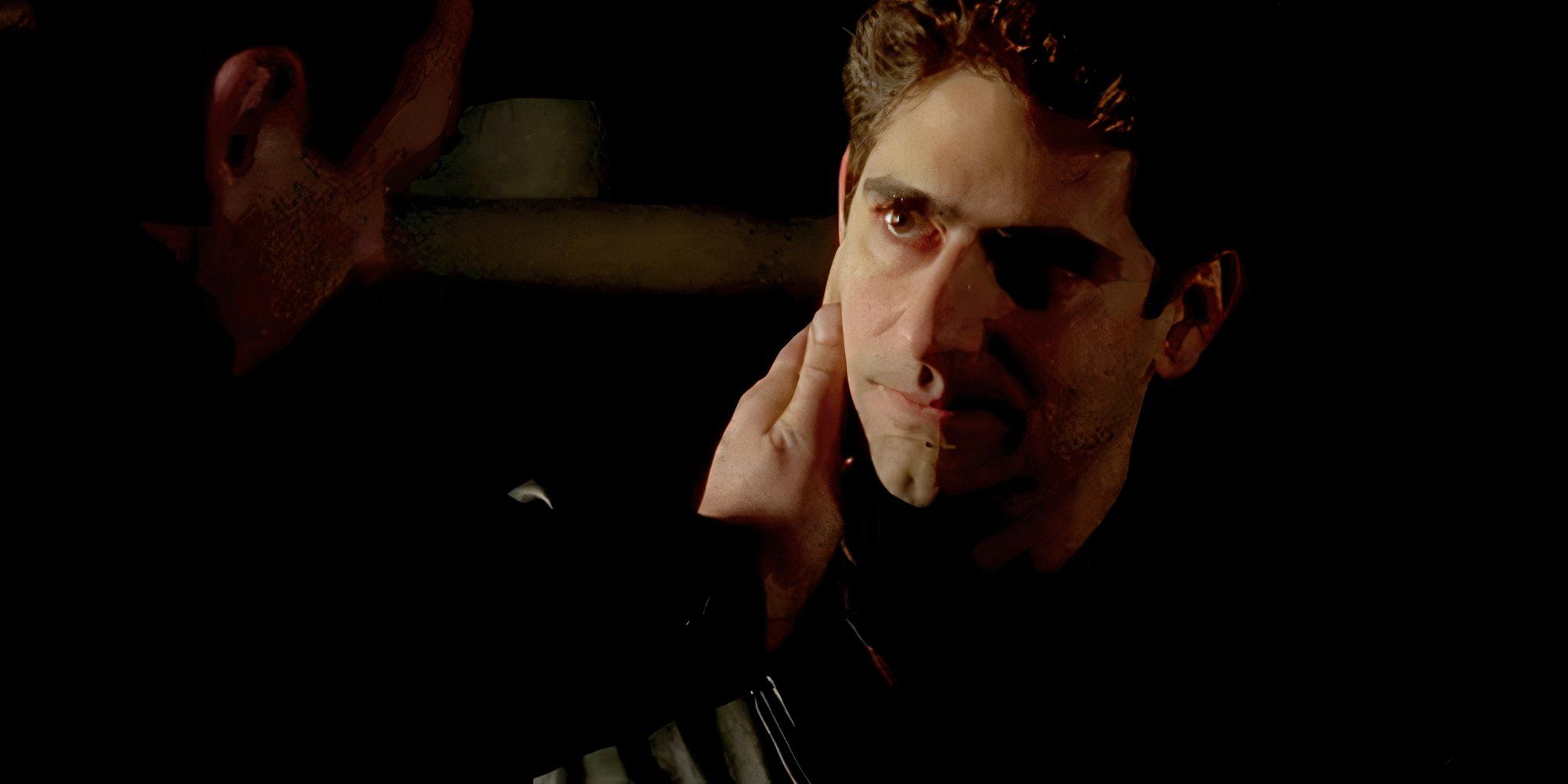 James Gandolfini with his hand on Michael Imperioli cheek in The Sopranos episodeEverybody Hurts