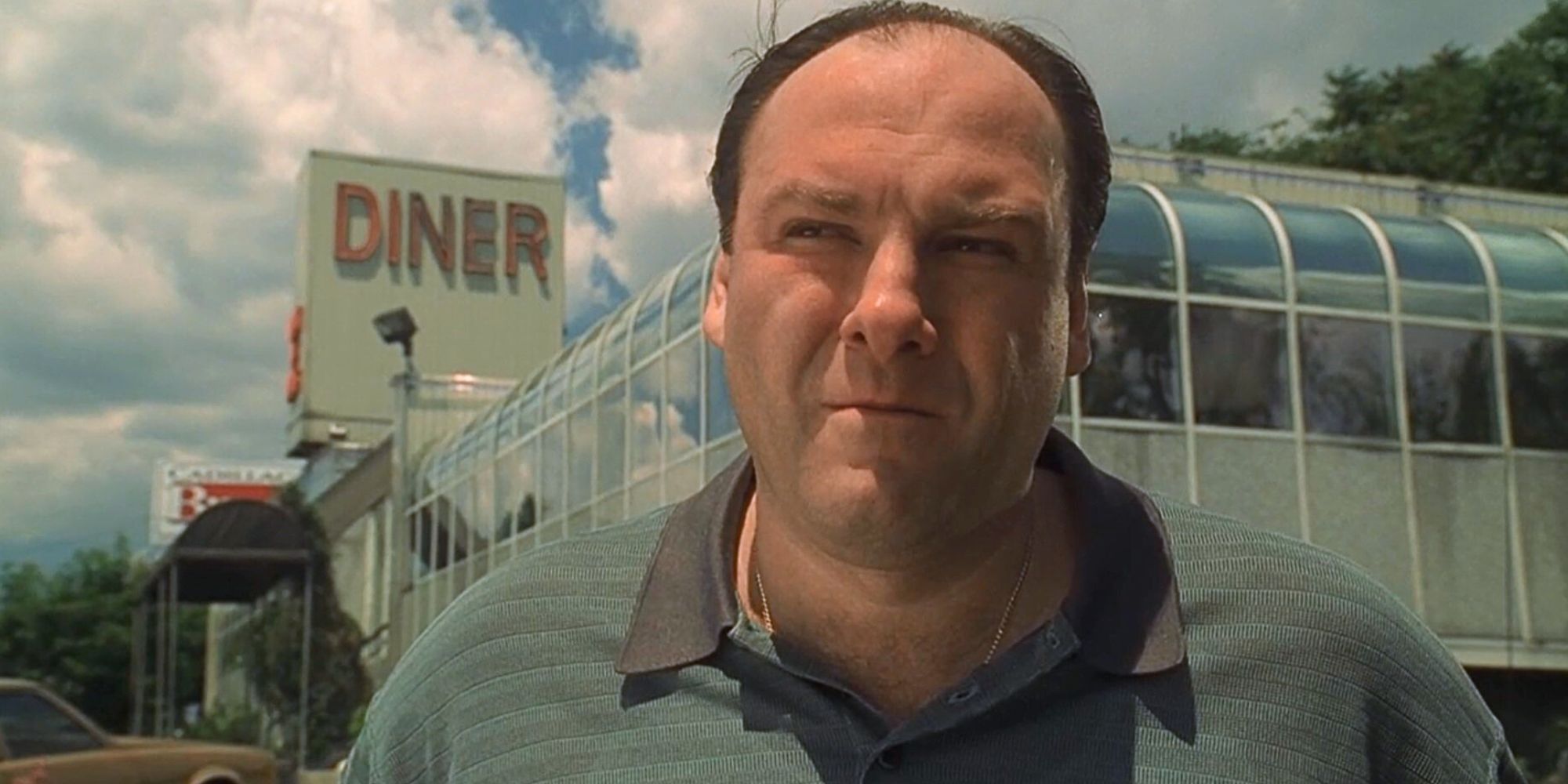 James Gandolfini standing outside a diner in The Sopranos S2, E1