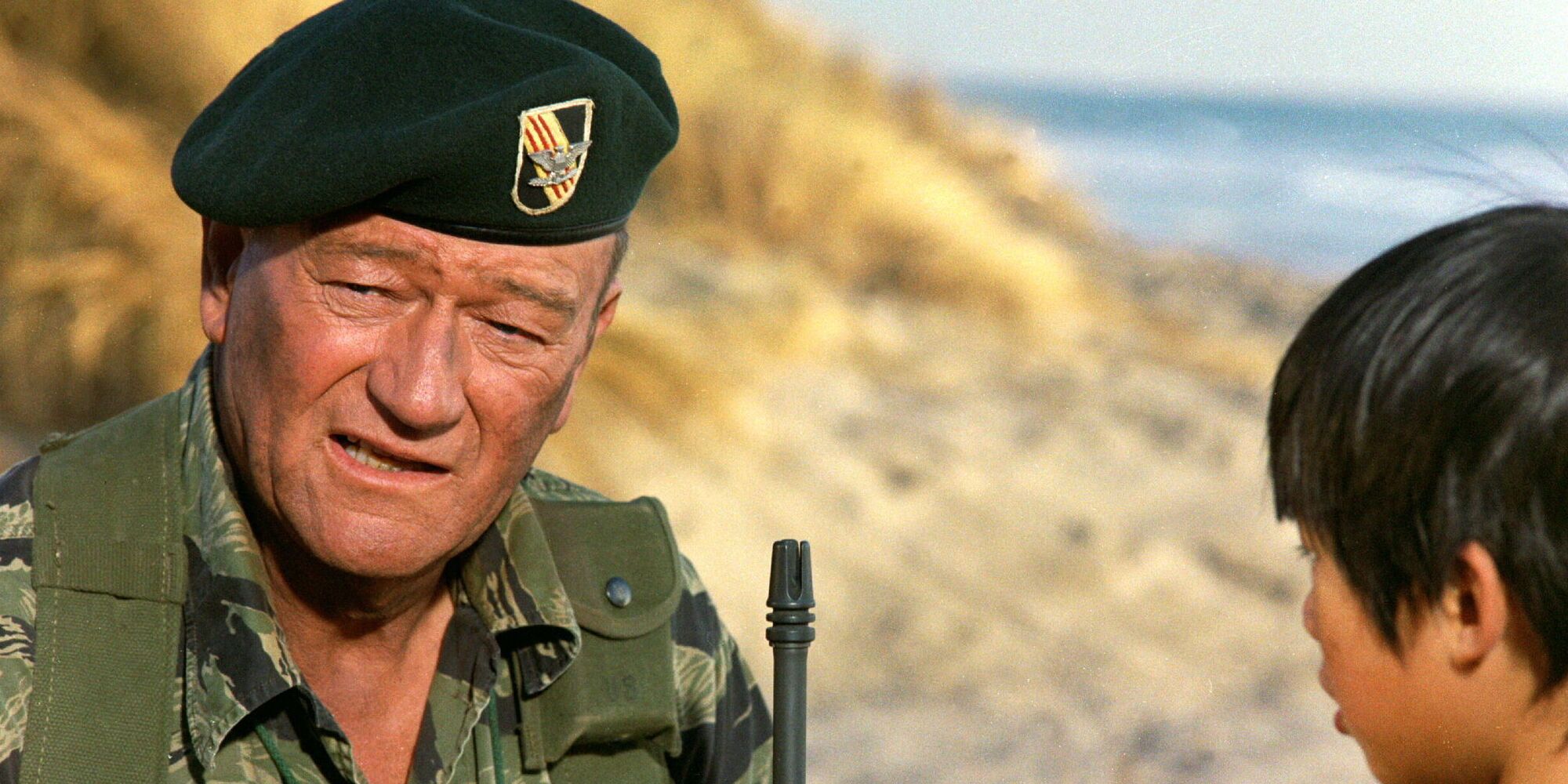 John Wayne with a young boy in 'The Green Berets'