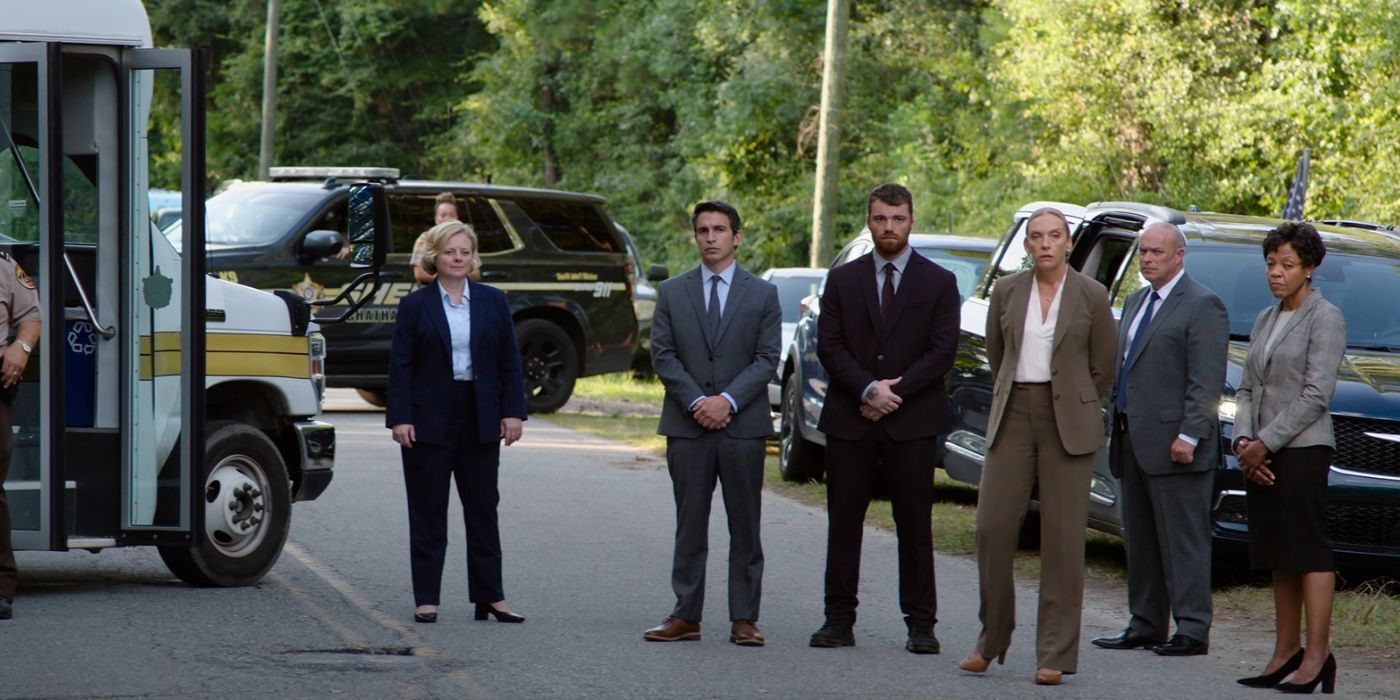 Chris Messina, Gabriel Basso, and Toni Collette standing by a prison bus in Juror No. 2.