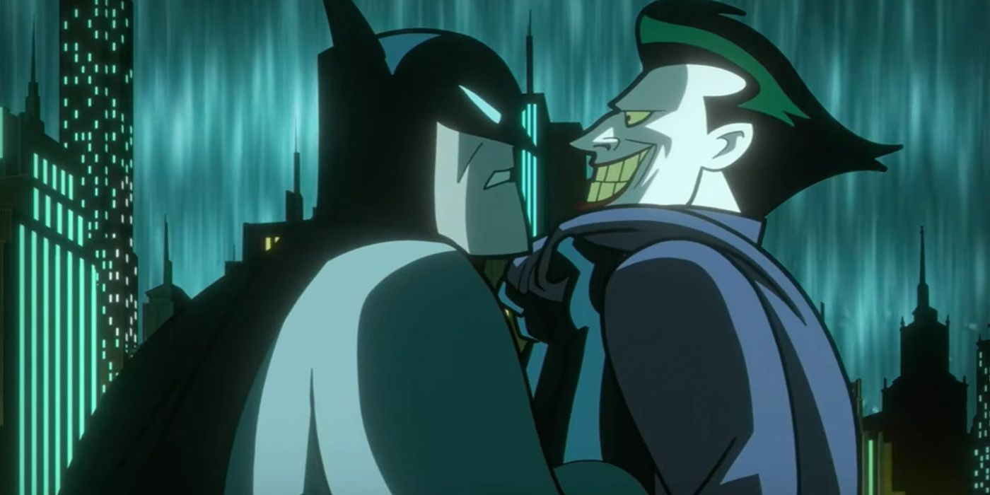 Batman (Kevin Conroy) grabs the Joker (Mark Hamill) as reality crumbles around them in 'Justice League: Crisis on Infinite Earths - Part 3.'